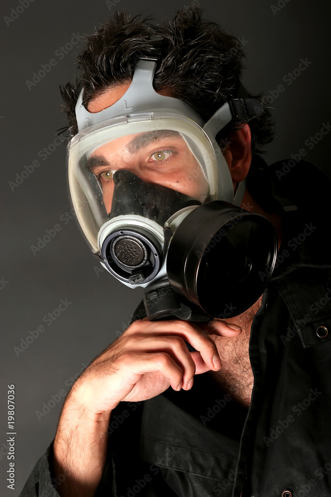Young man with gasmask Young man with gasmask
