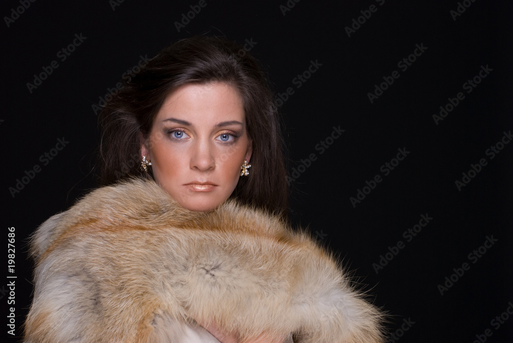 Close up portrait of young fashion woman in fur Close up portrait of young fashion woman in fur