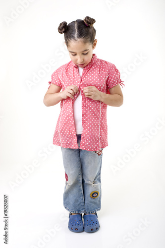 young girl dressing