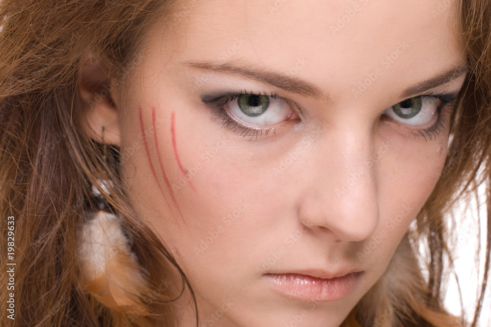 Obraz premium Closeup portrait of young emotional savage woman