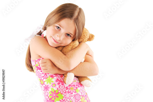 Little girl taking teddy bear