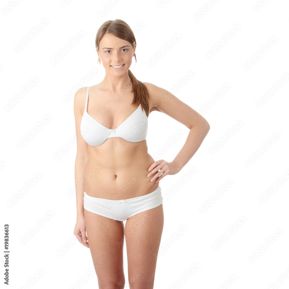 Foto de Beautiful caucasian woman in white underwear do Stock