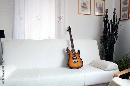 Guitar On The Sofa photo