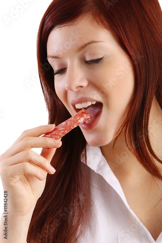 young woman with sausage (isolated)