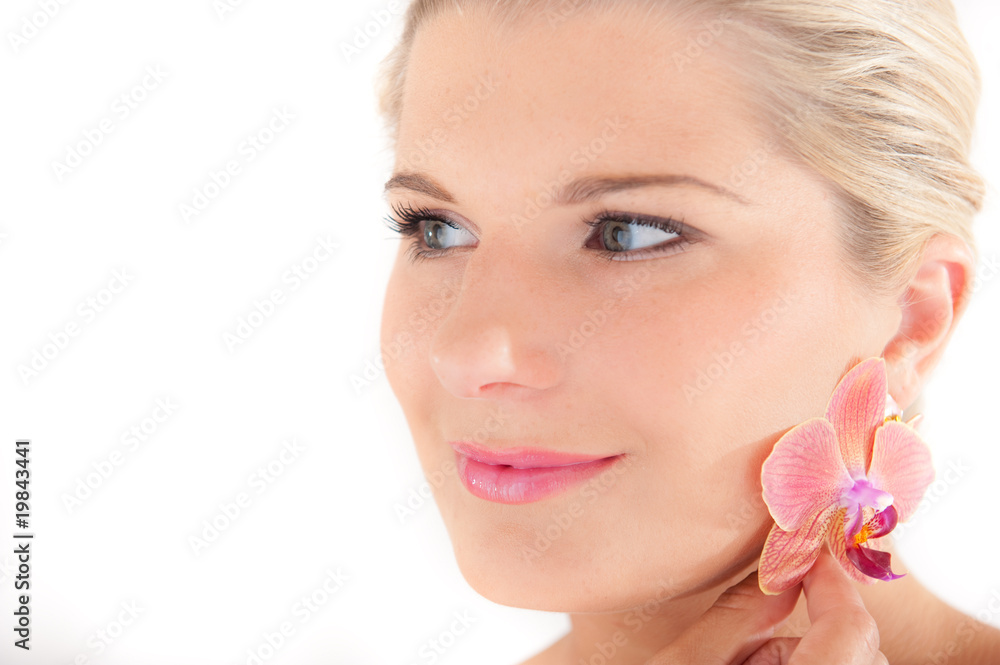 Healthy spa woman with pink orchid