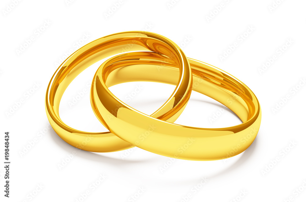Fotografie Two gold wedding rings lie together
