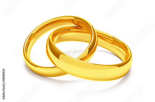 Two gold wedding rings lie together
