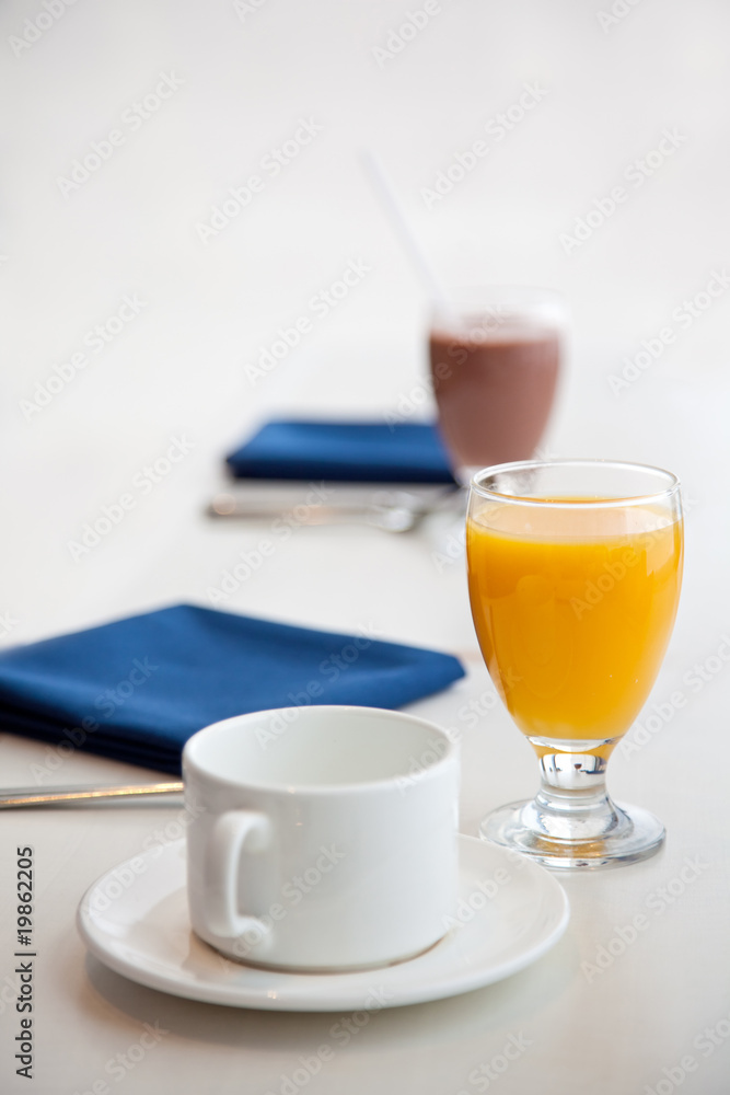 Orange juice & chocolate milk - waiting for breakfast Orange juice & chocolate milk - waiting for breakfast