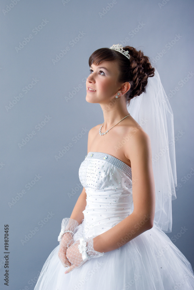 Beauty young bride dressed in elegance white wedding dress Beauty young bride dressed in elegance white wedding dress