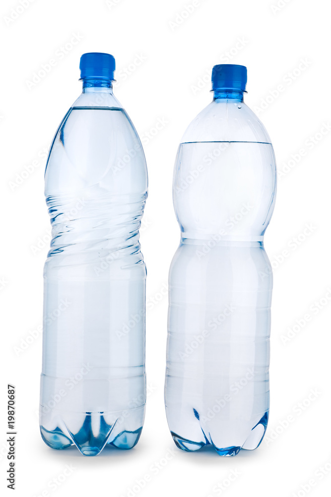 two blue transparent bottle with water isolated on a white backg two blue transparent bottle with water isolated on a white backg