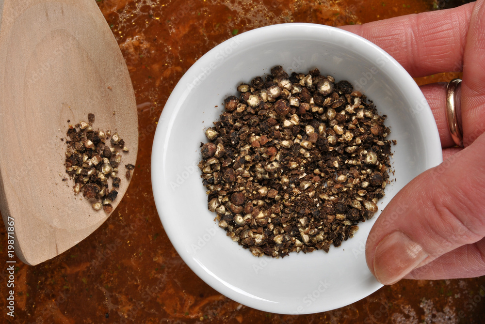 add some organic black pepper into a sauce add some organic black pepper into a sauce