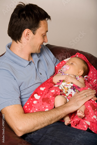 Father and baby at home photo