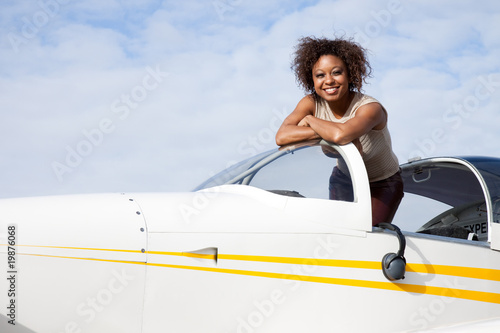 African American woman flying a private plane