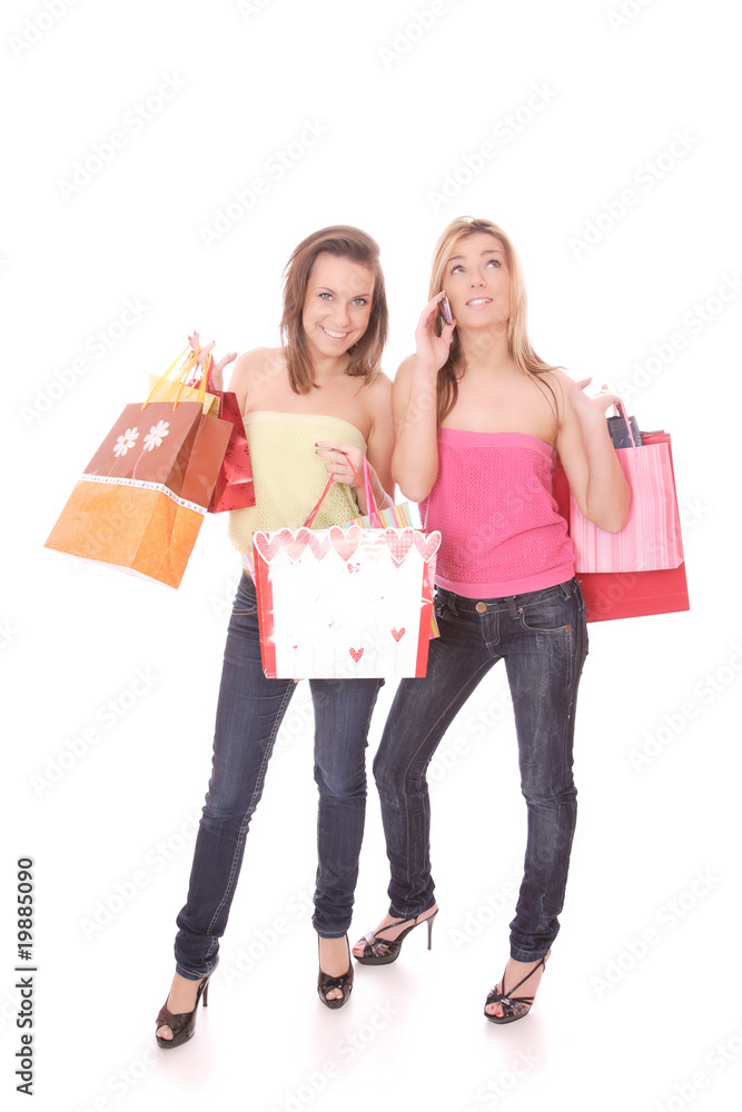 Two happy young beautiful women with the purchases Two happy young beautiful women with the purchases