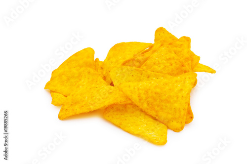 Heap of chips arranged on background