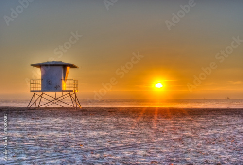 Lifeguard tower at sunset in HDR