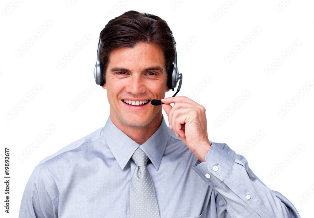 Self-assured Businessman talking on headset Self-assured Businessman talking on headset