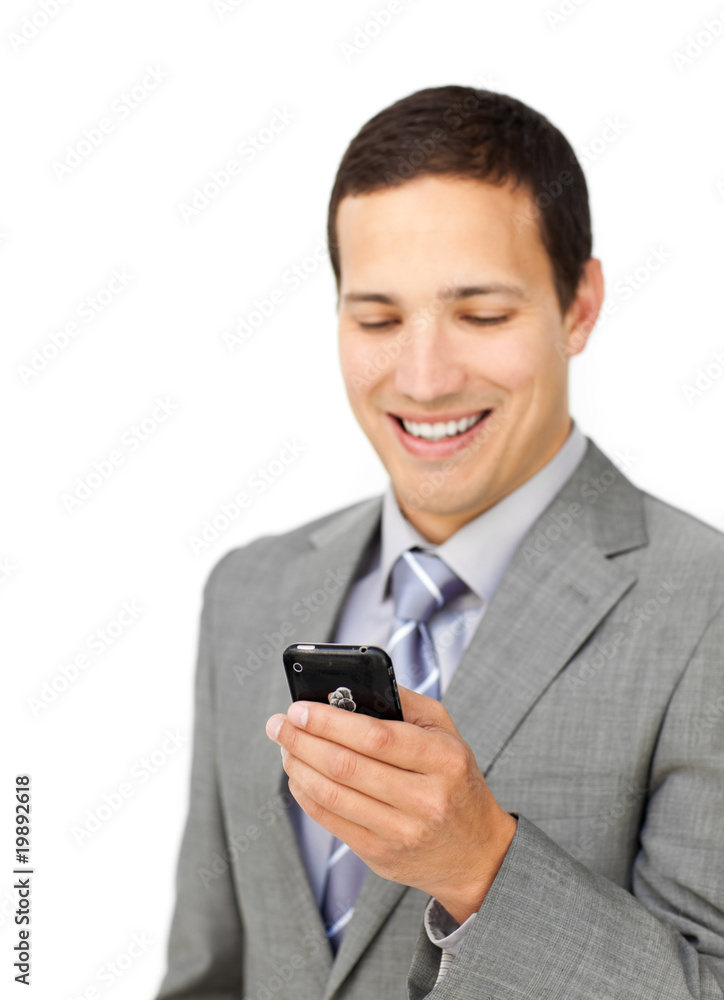 Self-assured male executive using a mobile phone Self-assured male executive using a mobile phone