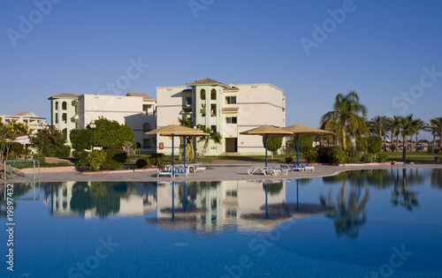 Swimming pool on a sunny day. Hurghada city in Egypt. © OlegD