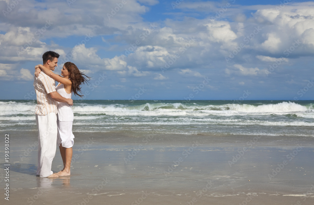 Man and Woman Couple Having In Romantic Embrace On Beach Man and Woman Couple Having In Romantic Embrace On Beach