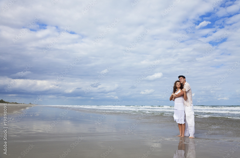 Man and Woman Couple Having In Romantic Embrace On Beach Man and Woman Couple Having In Romantic Embrace On Beach
