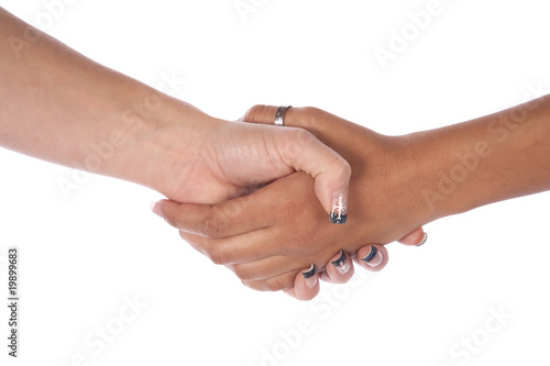 two female hands shaking