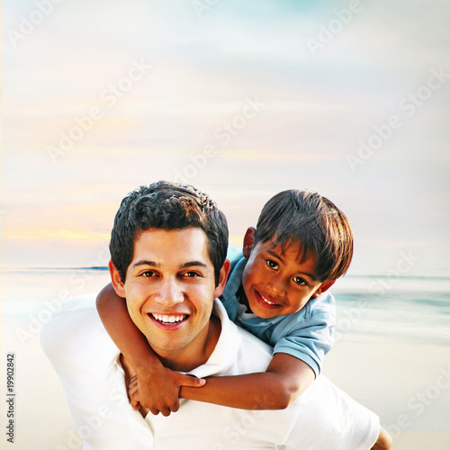 Happy Father and Son at the Beach © Monart Design