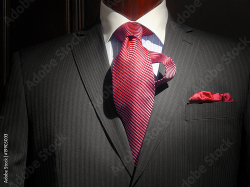 Striped jacket with red striped tie and handkerchief