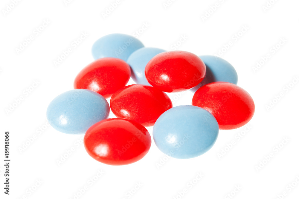 Red and blue pills isolated on white Red and blue pills isolated on white