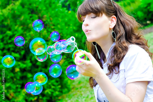 smile teen with soap bubbles