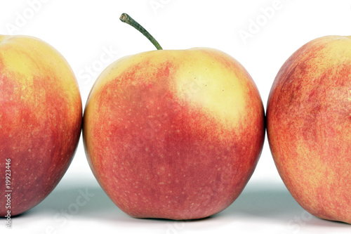 A line of red apples.