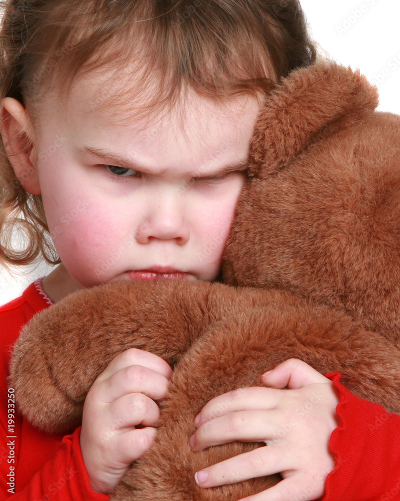 Little girl frowning Little girl frowning