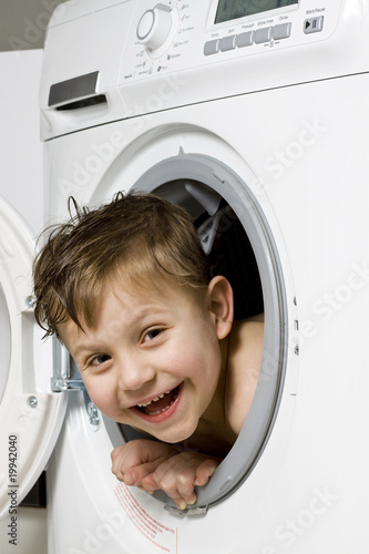 happy boy in the washing machine