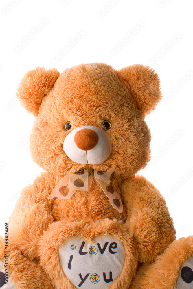 Fototapeta premium Teddy bear with heart shape isolated on white background