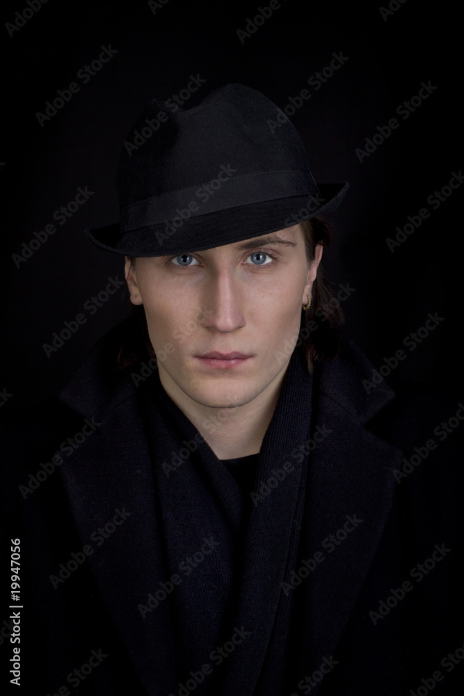Man in black hat look at you Man in black hat look at you