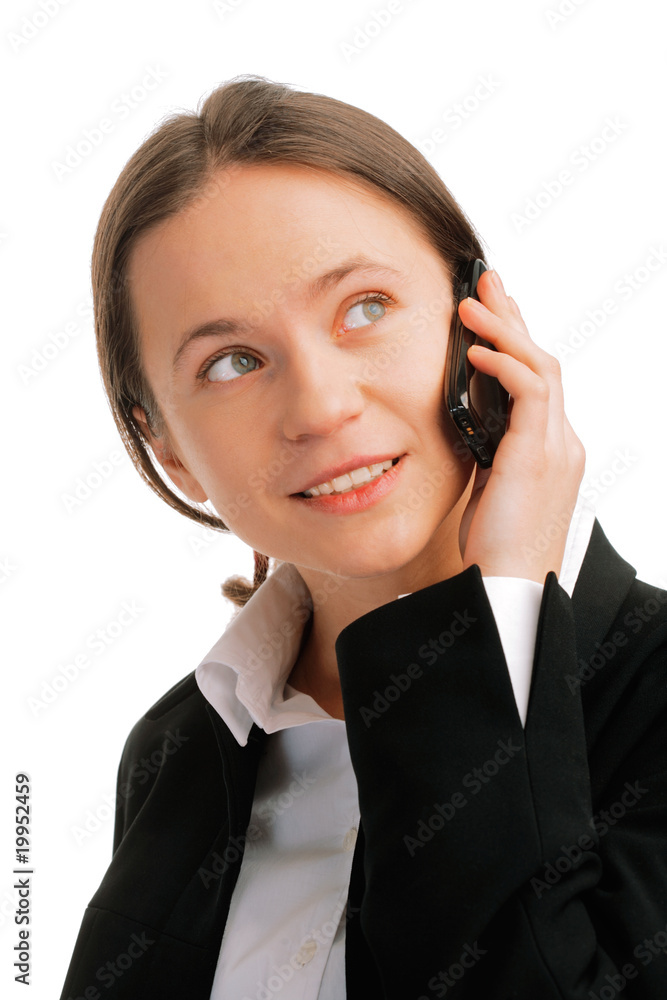 Young business woman talking on mobile phone Young business woman talking on mobile phone