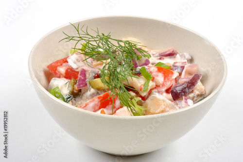 some fresh organic herring salad with tomato