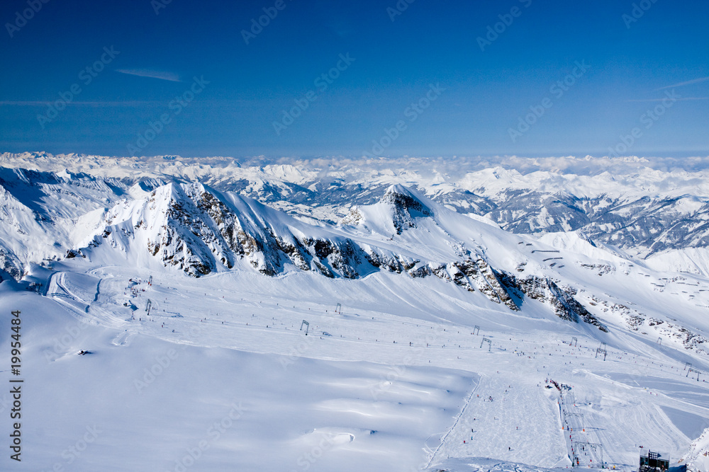 Obraz premium Ski lifts in alps mountains