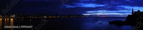 Panoramic view of El "Morro" lighthouse and havana bay at dusk