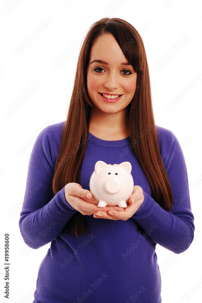Girl holding piggy bank Girl holding piggy bank