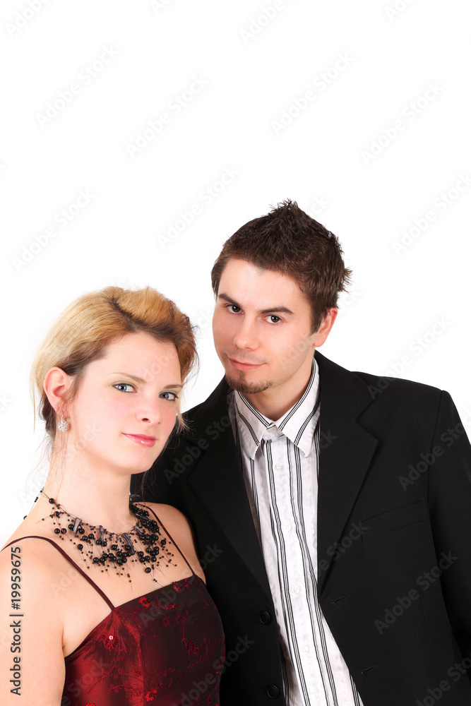 Portrait of well-dressed young couple, studio shot Portrait of well-dressed young couple, studio shot