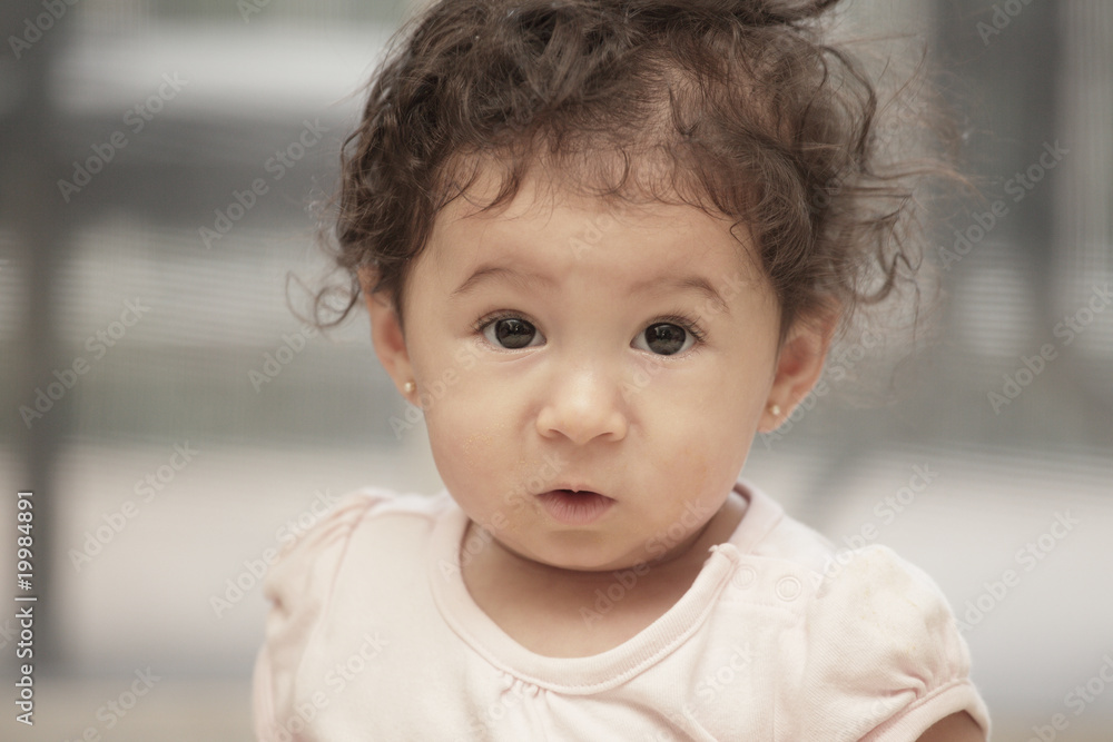 Headshot of an adorable little baby girl