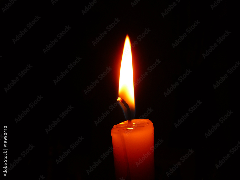 Candle burning in the dark Candle burning in the dark