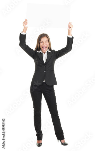 Business woman excited holding white sign