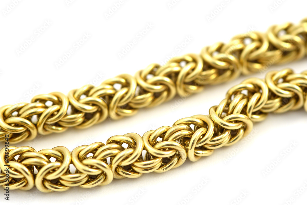 Obraz premium gold chain on the white background