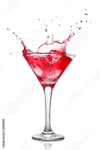 Martini cocktail with splash isolated on white