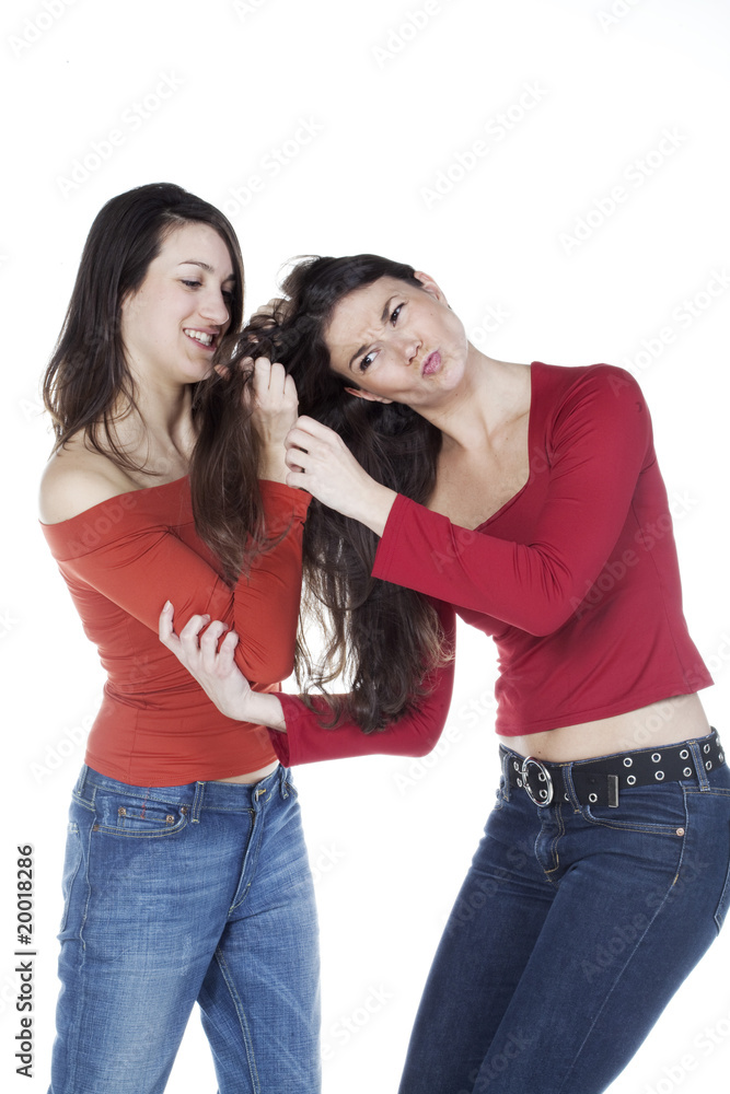 dispute de deux jeunes filles tirer les cheveux Stock Photo | Adobe Stock