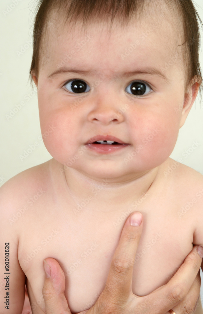 Sight of the nice little girl at a white background Sight of the nice little girl at a white background