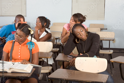 Highschool students messing in class during break
