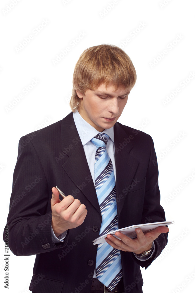 Portrait of young businessman with personal organizer